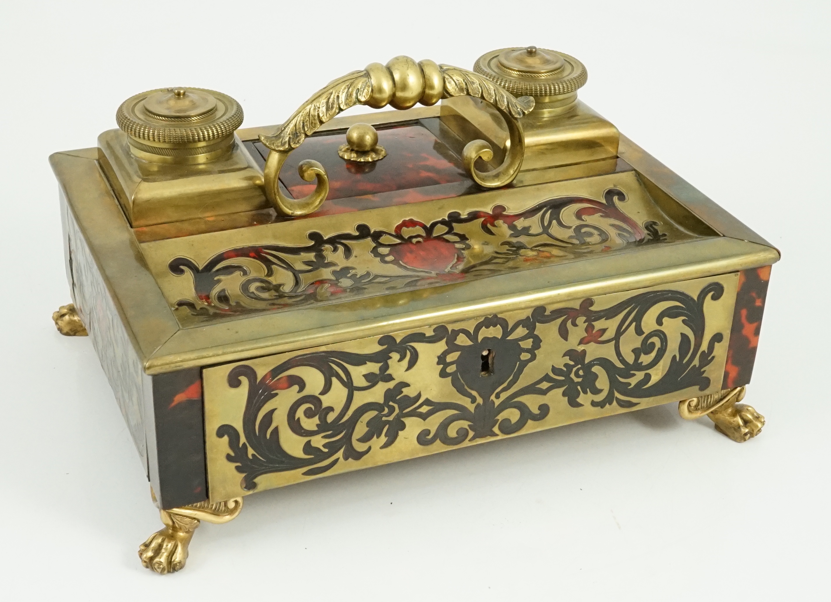 A 19th century Louis XIV style red boulle inkstand, 25cm wide, 18cm deep, 13cm high